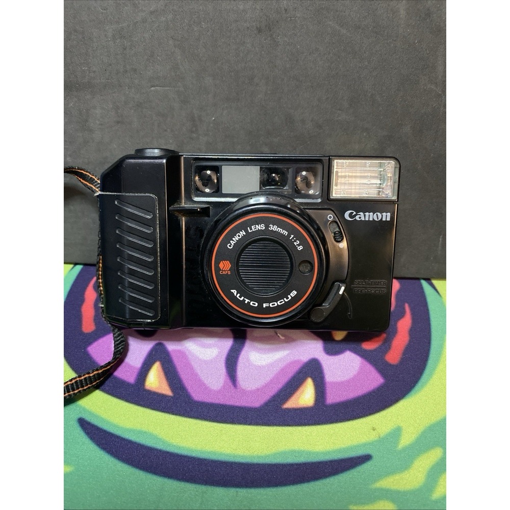 Vintage Canon Sure Shot W Strap 35mm Film Camera 38mm f/2.8 Nice B3